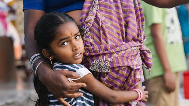 child huging mother